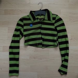 Green and black cropped shirt